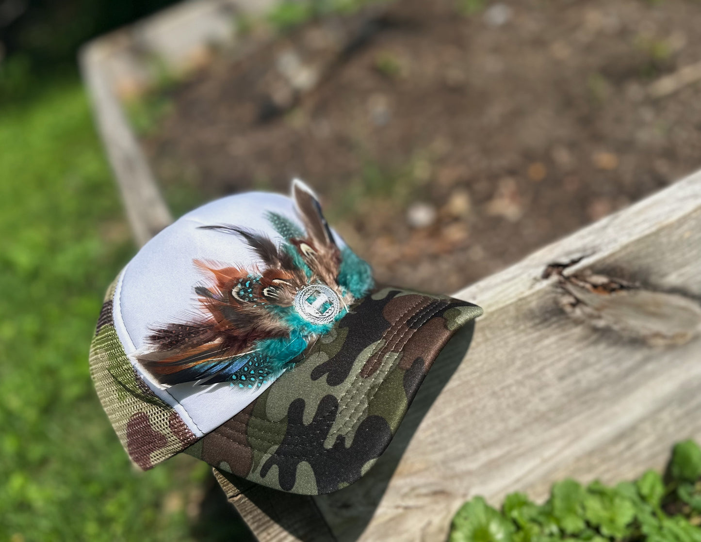 Ruffle some feathers trucker hat